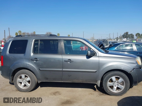 2009 Honda Pilot EX with VIN 5FNYF48439B036957, listed as a IAAI auction lot 41656284 with 199,115 mi miles. Bid and sale history available at carsss.com. Image 13.