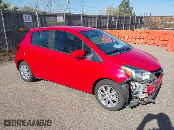 2015 Toyota Yaris L with VIN VNKKTUD38FA033446, listed as a IAAI auction lot 42014271 with 14,564 mi miles. Bid and sale history available at carsss.com. Image 1.