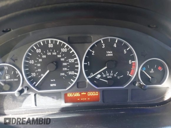 2003 BMW 3 Series 330i with VIN WBAEV53453KM03321, listed as a IAAI auction lot 41134433 with 186,586 mi miles. Bid and sale history available at carsss.com. Image 7.