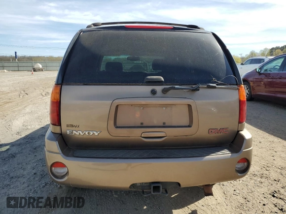 2003 GMC Envoy SLT z VIN 1GKDS13S032134647, wystawiony jako Copart lot #50137325 z przebiegiem 217 878 mil mil oraz Szkody całkowita. Historia ofert i sprzedaży dostępna na DreamBid. Obrazek 6.