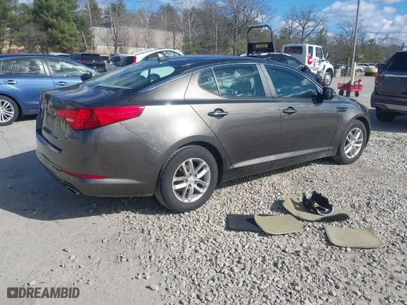 2012 Kia Optima LX with VIN 5XXGM4A72CG083861, listed as a IAAI auction lot 41909434 with 124,526 mi miles. Bid and sale history available at carsss.com. Image 4.