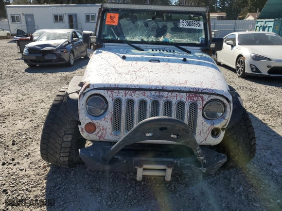2011 Jeep Wrangler Unlimited Sahara with VIN 1J4BA5H18BL618713, listed as a Copart auction lot 53508695 with 187,328 mi miles and Salvage Title. Bid and sale history available at carsss.com. Image 5.