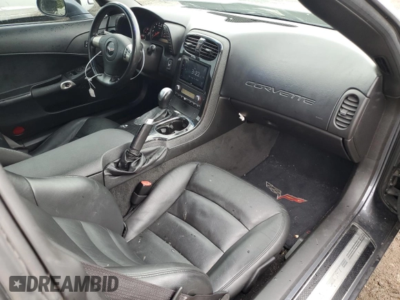 2011 Chevrolet Corvette 1LT z VIN 1G1YE2DW8B5105978, wystawiony jako Copart lot #75264194 z przebiegiem 144 427 mil mil oraz Szkoda całkowita • Salvage title. Historia ofert i sprzedaży dostępna na DreamBid. Obrazek 11.