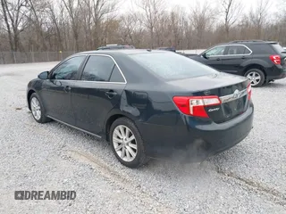 2014 Toyota Camry SE with VIN 4T1BK1FK7EU548333, listed as a IAAI auction lot 41598278 with 119,534 mi miles. Bid and sale history available at carsss.com. Image 3.
