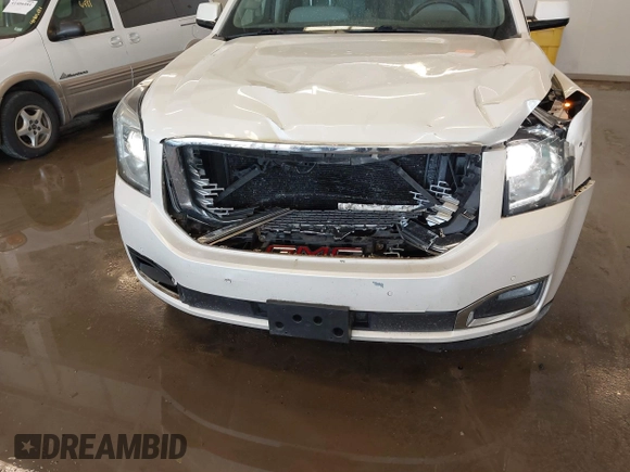 2015 GMC Yukon XL Denali with VIN 1GKS2JKJXFR528927, listed as a IAAI auction lot 41391259 with 159,467 mi miles. Bid and sale history available at carsss.com. Image 18.