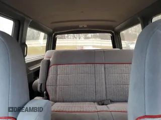 1990 Ford Aerostar with VIN 1FMDA31X6LZB41923, listed as a Copart auction lot 86900154 with 11,339 mi miles and Salvage Title. Bid and sale history available at carsss.com. Image 10.