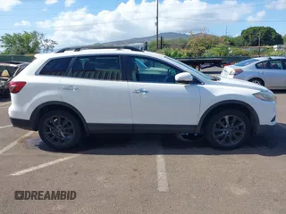 2015 Mazda CX-9 Grand Touring с VIN JM3TB2DA7F0456065, выставлен на аукционе IAAI как лот 42328501 с пробегом 116 951 миль миль и . История ставок и продаж доступна на DreamBid. Изображение 13.
