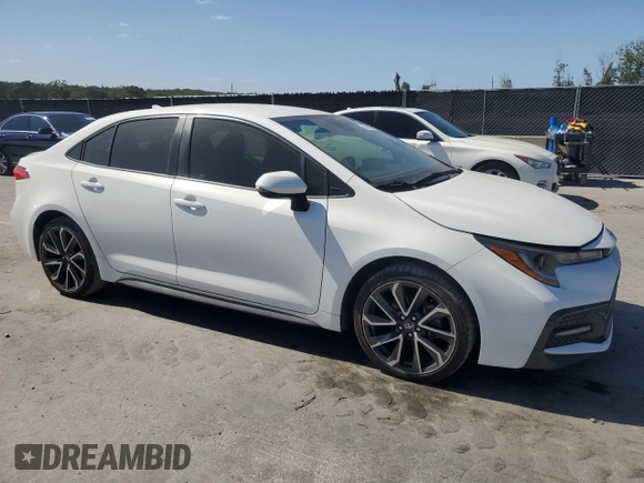 2020 Toyota Corolla SE with VIN JTDS4RCE7LJ031088, listed as a Copart auction lot 55450795 with 148,455 mi miles and Clean Title. Bid and sale history available at DreamBid. Image 4.