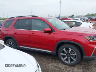 2025 Honda Pilot Elite z VIN 5FNYG1H82SB053897, wystawiony jako IAAI lot #42159290 z przebiegiem 6 168 mil mil oraz . Historia ofert i sprzedaży dostępna na DreamBid. Obrazek 14.