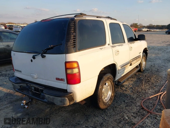 2003 GMC Yukon SLT with VIN 1GKEC13Z43J102238, listed as a IAAI auction lot 41618837 with 371,562 mi miles. Bid and sale history available at carsss.com. Image 4.