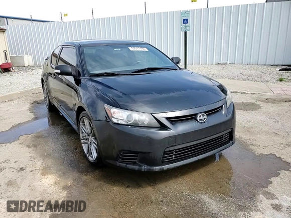 2012 Scion tC z VIN JTKJF5C76C3034769, wystawiony jako Copart lot #52517495 z przebiegiem 205 501 mil mil oraz Nie do naprawy • Non repairable. Historia ofert i sprzedaży dostępna na DreamBid. Obrazek 13.