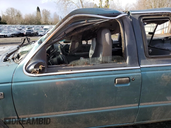 1994 Mazda B-Series Truck LE z VIN 4F4DR17X5RTN10704, wystawiony jako Copart lot #87230804 z przebiegiem 227 476 mil mil oraz Szkoda całkowita • Salvage title. Historia ofert i sprzedaży dostępna na DreamBid. Obrazek 7.