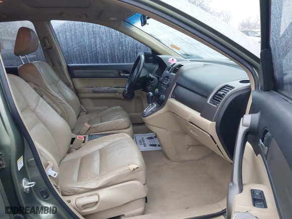 2009 Honda CR-V EX-L with VIN JHLRE38709C007153, listed as a IAAI auction lot 41443864 with 259,822 mi miles. Bid and sale history available at carsss.com. Image 5.