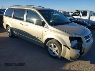 2010 Dodge Grand Caravan SXT with VIN 2D4RN5DX7AR185445, listed as a IAAI auction lot 41144775 with 192,879 mi miles and . Bid and sale history available at DreamBid. Image 1.