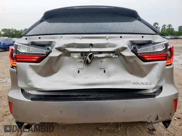 2019 Lexus RX 350 с VIN 2T2ZZMCAXKC119221, выставлен на аукционе Copart как лот 63496085 с пробегом 69 043 миль миль и Списание • Salvage title. История ставок и продаж доступна на DreamBid. Изображение 6.