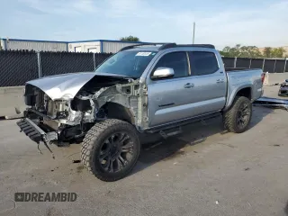 2023 Toyota Tacoma SR with VIN 3TYCZ5AN4PT113360, listed as a Copart auction lot 61152415 with 42,987 mi miles and Salvage title. Bid and sale history available at DreamBid. Image 1.