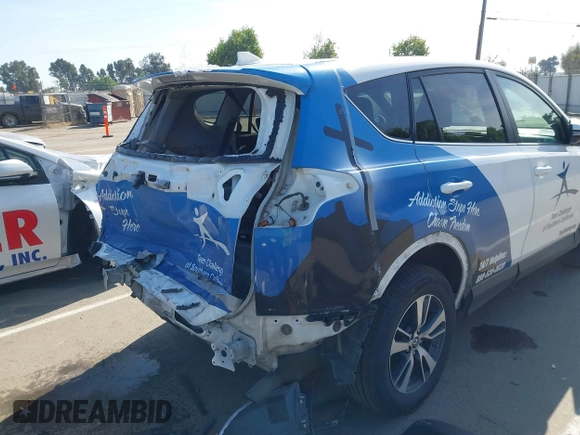 2018 Toyota RAV4 XLE with VIN 2T3WFREV7JW480326, listed as a IAAI auction lot 42021965 with 174,347 mi miles. Bid and sale history available at carsss.com. Image 18.