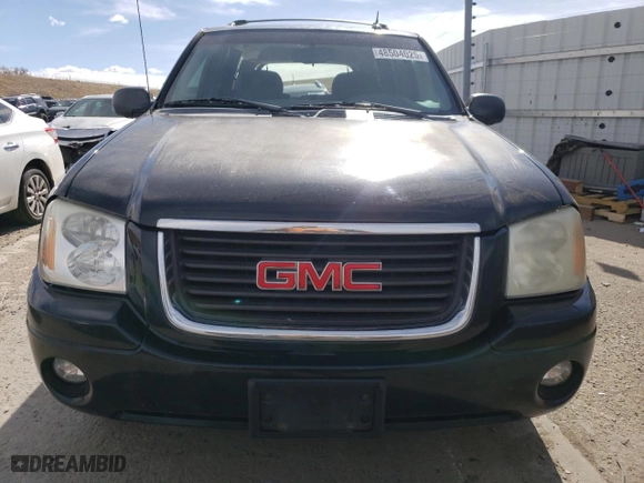 2005 GMC Envoy SLE with VIN 1GKDT13S952201133, listed as a Copart auction lot 48504025 with 200,240 mi miles and Salvage Title. Bid and sale history available at carsss.com. Image 5.