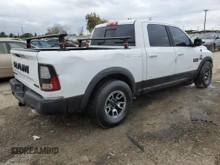 2018 Ram 1500 Rebel with VIN 1C6RR7YT7JS235965, listed as a Copart auction lot 84749674 with 61,484 mi miles and Salvage title. Bid and sale history available at DreamBid. Image 3.