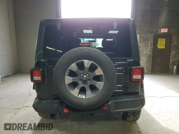 2022 Jeep Wrangler Unlimited Sahara Altitude with VIN 1C4HJXEG0NW115877, listed as a Copart auction lot 80689494 with 30,928 mi miles and Salvage title. Bid and sale history available at DreamBid. Image 6.
