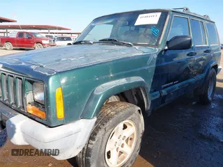 1999 Jeep Cherokee Sport with VIN 1J4FT68S6XL579735, listed as a IAAI auction lot 41484413 with 146,862 mi miles and . Bid and sale history available at DreamBid. Image 13.