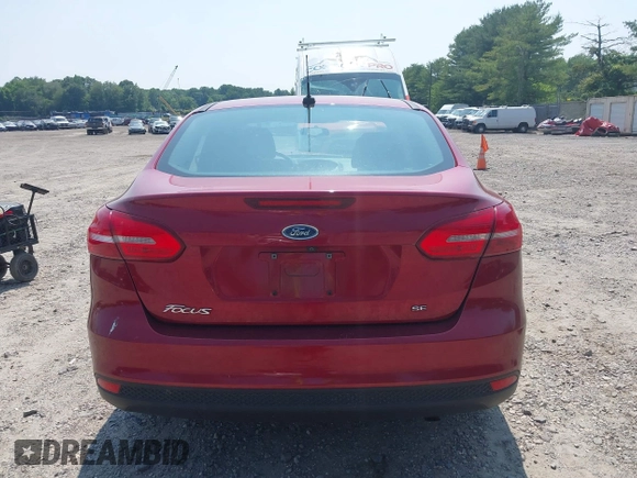 2017 Ford Focus SE z VIN 1FADP3F26HL305624, wystawiony jako IAAI lot #42411111 z przebiegiem 58 865 mil mil oraz . Historia ofert i sprzedaży dostępna na DreamBid. Obrazek 16.