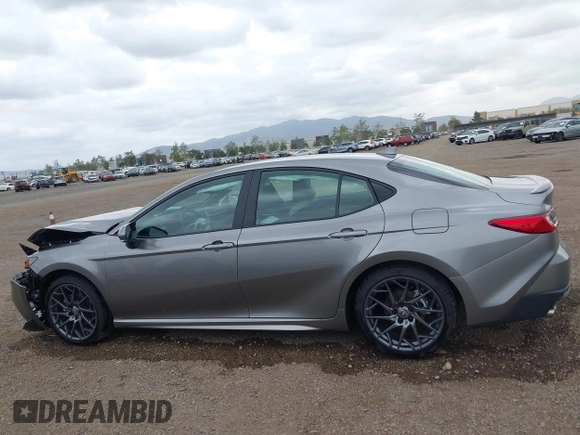 2025 Toyota Camry LE with VIN 4T1DAACK8SU571597, listed as a IAAI auction lot 42051463 with 1,681 mi miles and . Bid and sale history available at DreamBid. Image 14.