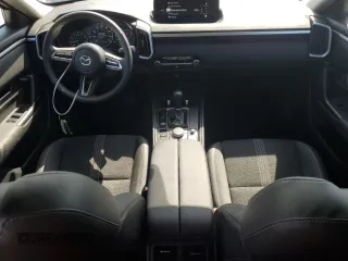 2025 Mazda CX-50 S Select with VIN 7MMVABAM0SN300739, listed as a Copart auction lot 77063434 with 3,042 mi miles and Salvage Title. Bid and sale history available at DreamBid. Image 8.