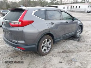 2019 Honda CR-V EX with VIN 7FARW1H57KE037678, listed as a IAAI auction lot 41790923 with 61,754 mi miles and . Bid and sale history available at DreamBid. Image 4.