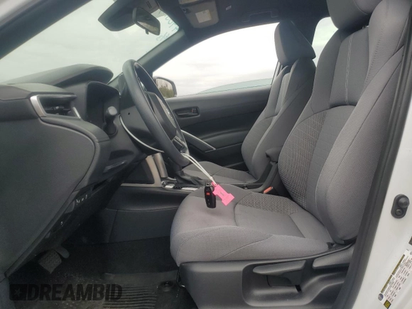 2023 Toyota Corolla Cross Hybrid S with VIN 7MUFBABG3PV010278, listed as a Copart auction lot 62003485 with 13,807 mi miles and Salvage title. Bid and sale history available at DreamBid. Image 7.