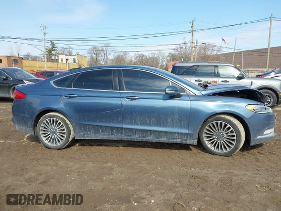 2018 Ford Fusion Titanium with VIN 3FA6P0D94JR187880, listed as a IAAI auction lot 41690869 with 120,214 mi miles and . Bid and sale history available at DreamBid. Image 13.