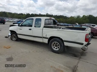 1995 Toyota T100 DX with VIN JT4VD12E2S0009844, listed as a Copart auction lot 51738525 with 357,475 mi miles and Salvage Title. Bid and sale history available at carsss.com. Image 2.