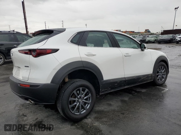 2023 Mazda CX-30 S with VIN 3MVDMBAM4PM522056, listed as a Copart auction lot 49122975 with 16,624 mi miles and Salvage title. Bid and sale history available at DreamBid. Image 3.