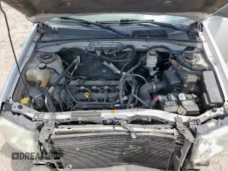 2011 Ford Escape XLT z VIN 1FMCU9D77BKB26159, wystawiony jako Copart lot #59211745 z przebiegiem 252 374 mil mil oraz Szkoda całkowita • Salvage title. Historia ofert i sprzedaży dostępna na DreamBid. Obrazek 11.