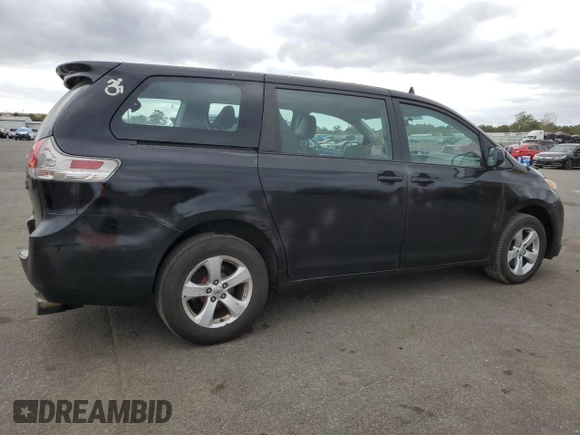 2014 Toyota Sienna L with VIN 5TDZK3DC2ES480859, listed as a Copart auction lot 72732274 with 174,276 mi miles and Non Repairable. Bid and sale history available at carsss.com. Image 3.