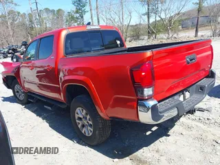 2018 Toyota Tacoma SR5 with VIN 5TFAZ5CN5JX066115, listed as a IAAI auction lot 41816133 with 70,283 mi miles and . Bid and sale history available at DreamBid. Image 3.