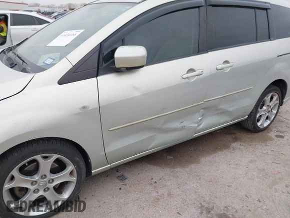 2008 Mazda 5 Sport with VIN JM1CR293080303089, listed as a IAAI auction lot 41434166 with 127,573 mi miles and . Bid and sale history available at carsss.com. Image 6.