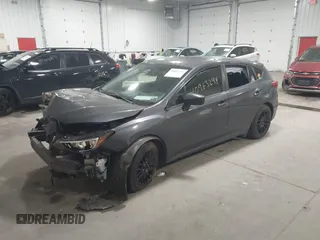 2018 Subaru Impreza with VIN 4S3GTAA65J3713216, listed as a IAAI auction lot 40963294 with 94,176 mi miles and . Bid and sale history available at DreamBid. Image 17.