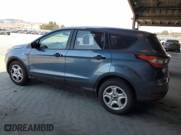 2018 Ford Escape S with VIN 1FMCU0F79JUB86844, listed as a Copart auction lot 64446735 with 155,329 mi miles and Salvage title. Bid and sale history available at DreamBid. Image 2.
