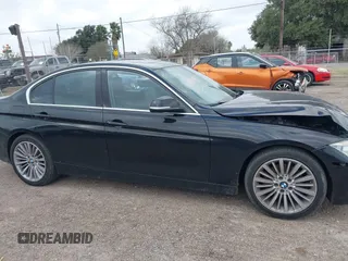 2013 BMW 3 Series 328i with VIN WBA3A5C58DF352998, listed as a IAAI auction lot 41516042 with 205,977 mi miles. Bid and sale history available at carsss.com. Image 13.