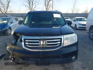 2013 Honda Pilot Touring with VIN 5FNYF4H96DB006582, listed as a IAAI auction lot 41722386 with 220,354 mi miles and . Bid and sale history available at carsss.com. Image 13.