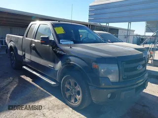2014 Ford F-150 XL with VIN 1FTFX1CT7EFD11303, listed as a IAAI auction lot 41414356 with 183,586 mi miles. Bid and sale history available at carsss.com. Image 1.