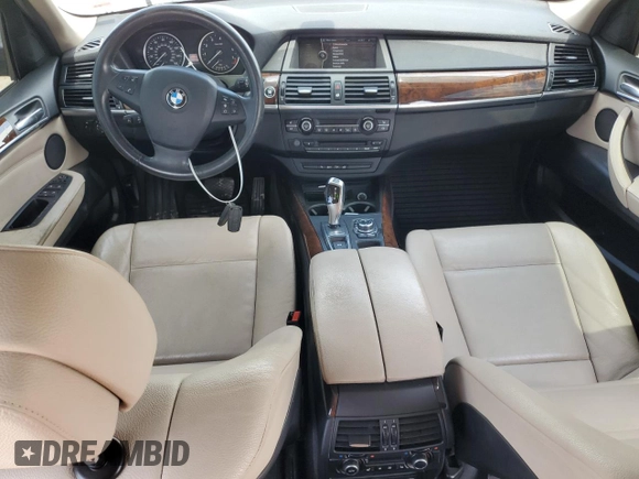 2012 BMW X5 35i с VIN 5UXZV4C58CL987049, выставлен на аукционе Copart как лот 61013925 с пробегом 167 508 миль миль и Чистый • Clean title. История ставок и продаж доступна на DreamBid. Изображение 8.