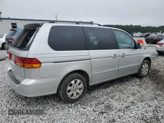 2004 Honda Odyssey EX-L with VIN 5FNRL18044B069774, listed as a Copart auction lot 57096535 with 165,307 mi miles and Salvage title. Bid and sale history available at DreamBid. Image 3.