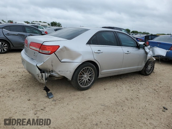 2011 Lincoln MKZ с VIN 3LNHL2GC7BR764304, выставлен на аукционе Copart как лот 55140005 с пробегом 128 062 миль миль и Списание • Salvage title. История ставок и продаж доступна на DreamBid. Изображение 3.
