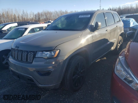 2022 Jeep Grand Cherokee WK Altitude with VIN 1C4RJFAG9NC140332, listed as a Copart auction lot 83763484 with 56,886 mi miles and Salvage Title. Bid and sale history available at carsss.com. Image 1.
