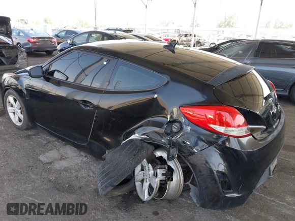 2013 Hyundai Veloster w/Black Int with VIN KMHTC6AD6DU088815, listed as a IAAI auction lot 42184776 with 204,930 mi miles and . Bid and sale history available at DreamBid. Image 3.