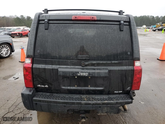 2010 Jeep Commander Sport with VIN 1J4RG4GK0AC128959, listed as a Copart auction lot 43027505 with 144,994 mi miles and Salvage Title. Bid and sale history available at carsss.com. Image 6.