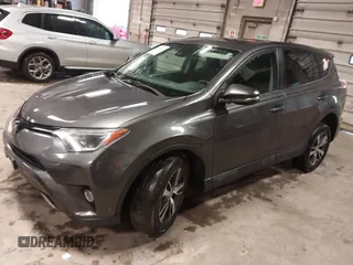 2018 Toyota RAV4 XLE with VIN 2T3RFREVXJW788412, listed as a IAAI auction lot 41931142 with 119,962 mi miles. Bid and sale history available at carsss.com. Image 2.