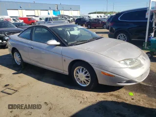 2001 Saturn SC with VIN 1G8ZY14751Z338353, listed as a Copart auction lot 75086154 with 100,044 mi miles and Clean Title. Bid and sale history available at carsss.com. Image 4.